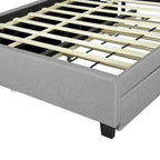 Lit plateforme rembourré avec tête de lit de rangement